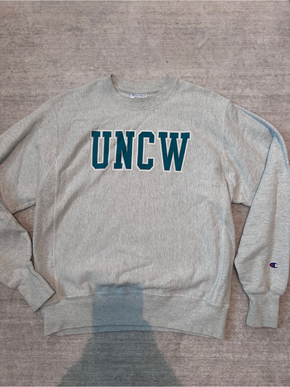 Champion Gray Crewneck Sweatshirt with Teal UNCW Lettering